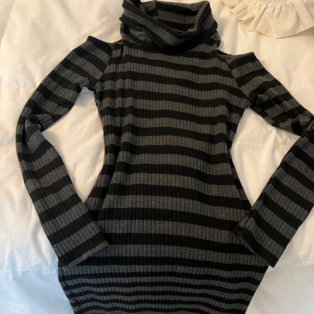 Knee length body dress black and gray striped with long sleeves. Shoulders bare